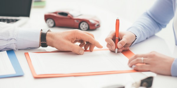 Signing car paperwork